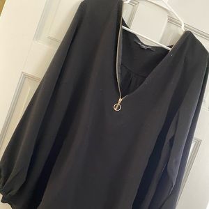Black blouse with gold zipper